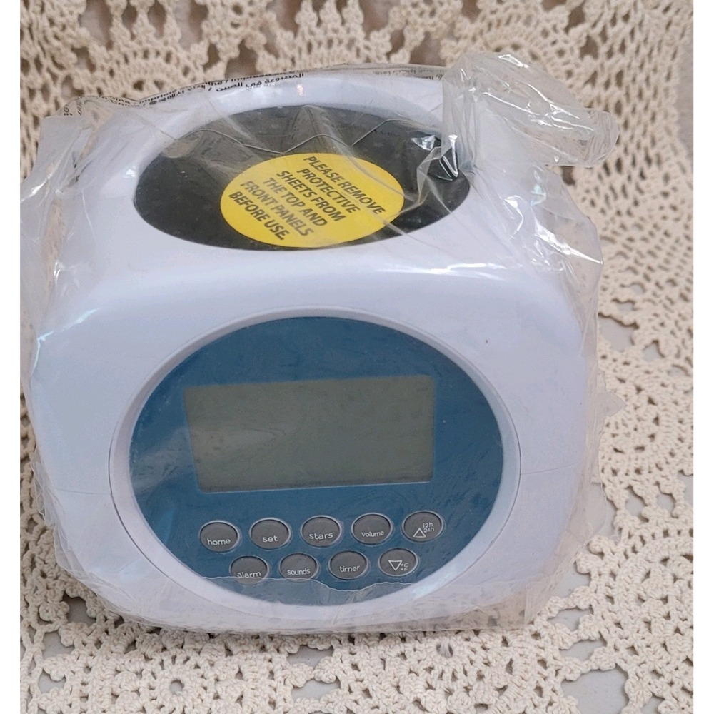 Discovery Projection Alarm Clock Sound Machine. 6 Nature & 4 Alarm Sounds. Stars